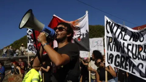 Nationwide Protests Begin Opposing Budget Slashing
