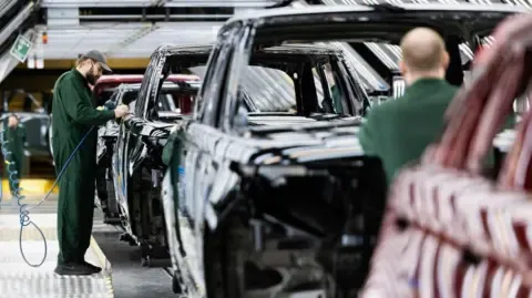 Jaguar Land Rover Vendor Network Staff Reportedly Instructed to Register for Government Benefits, Labor Group Claims